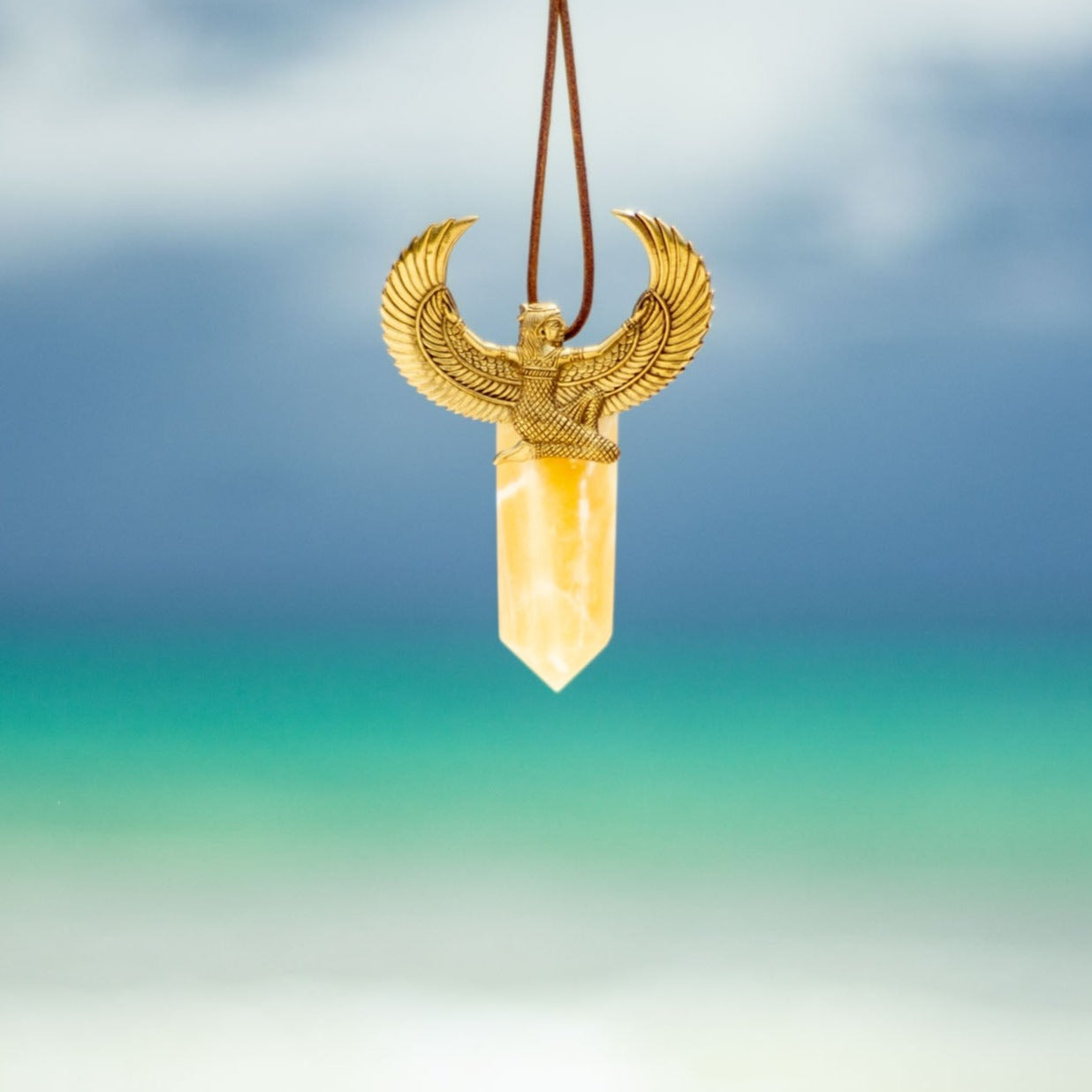 Isis Orange Calcite Pendant Brass